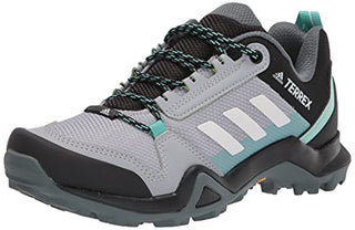 adidas outdoor Women's Terrex AX3 Hiking Boot, Halo Silver/Crystal White/Acid Mint, 10